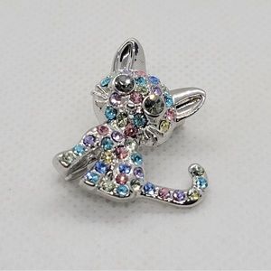 Small silver cat brooch with colored crystals